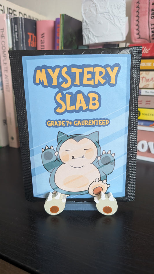 Pokémon Mystery Slab - Grade 7+ Guaranteed